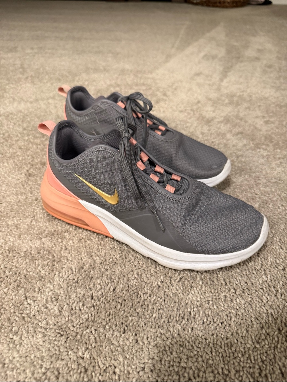 Nike Women's Gray Athletic Sneakers with Coral Heel and Gold Swoosh